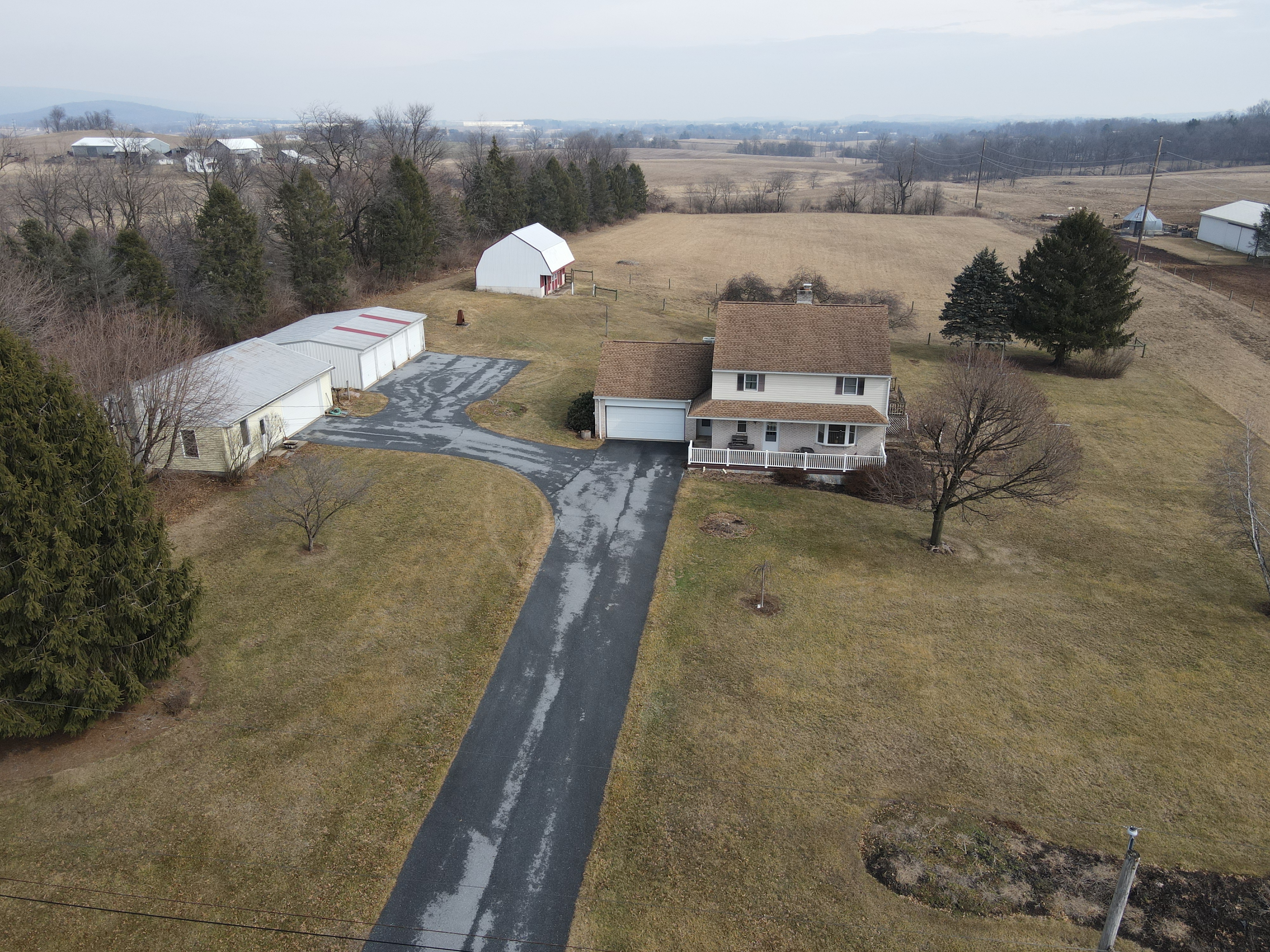 PARCEL 1: 5.5 ACRE PROPERTY W/ STABLES, SHOP & GARAGES